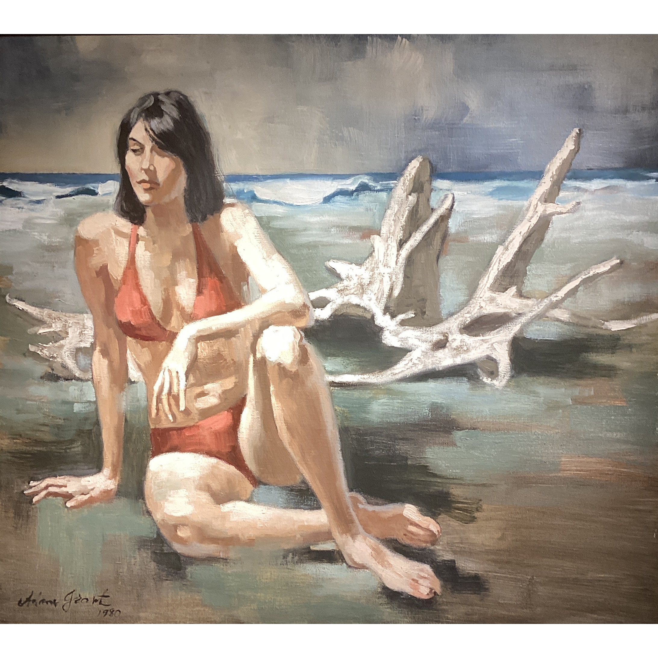 Woman on beach by Adam Grant