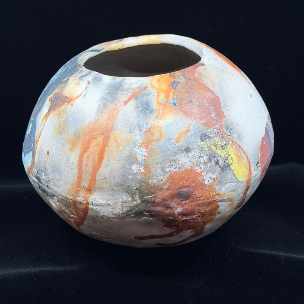 Rust, Black, White, Yellow Vessel