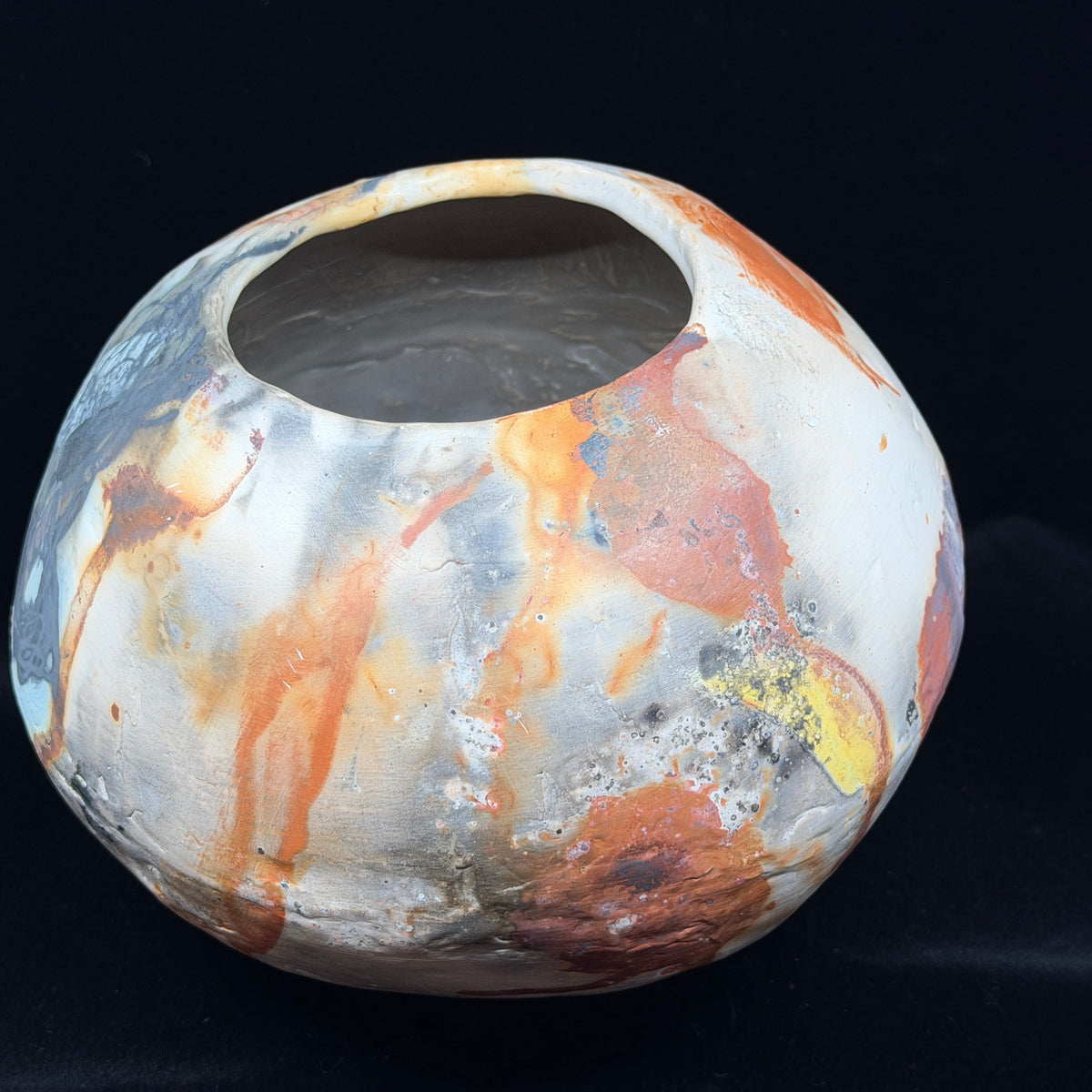 Rust, Black, White, Yellow Vessel