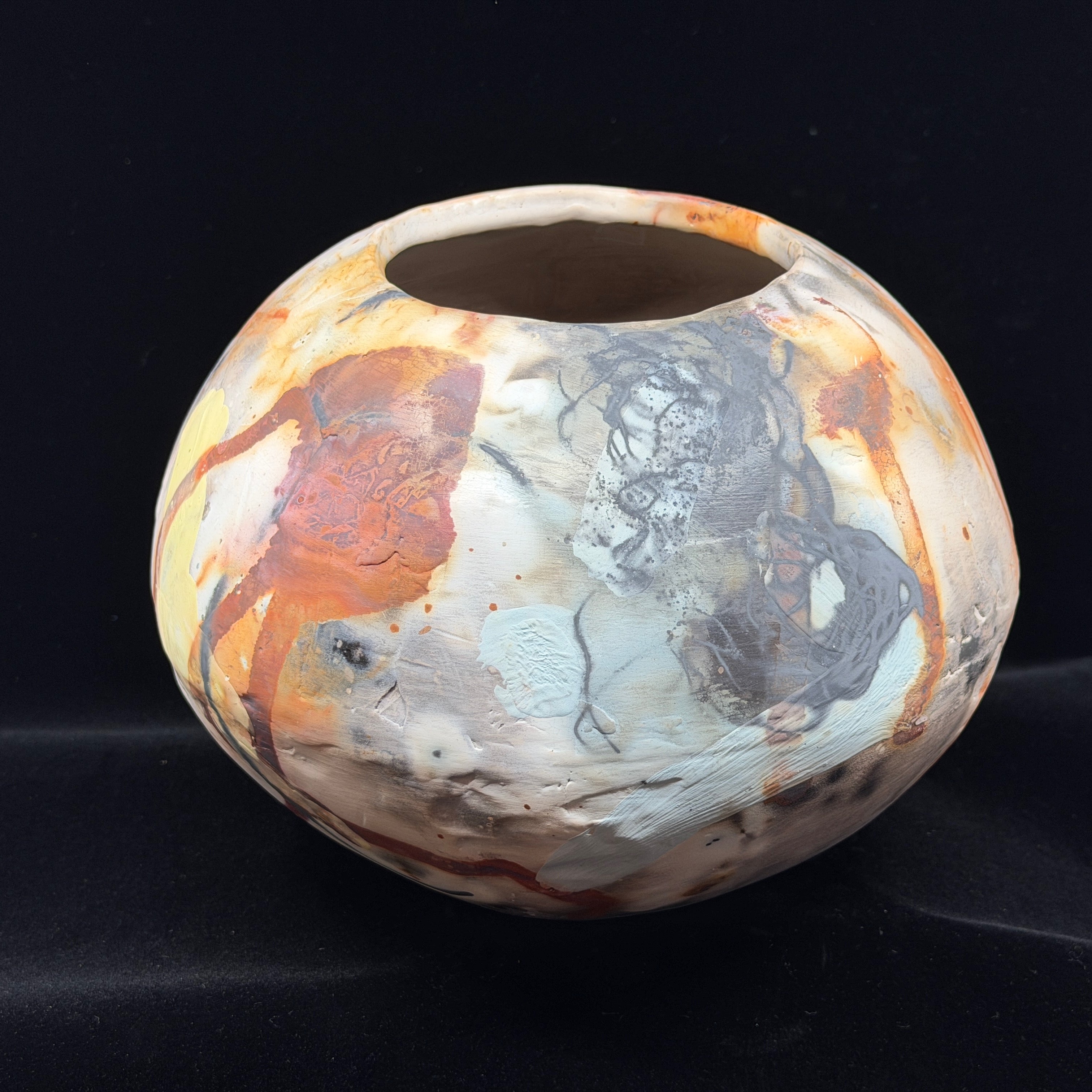 Rust, Black, White, Yellow Vessel