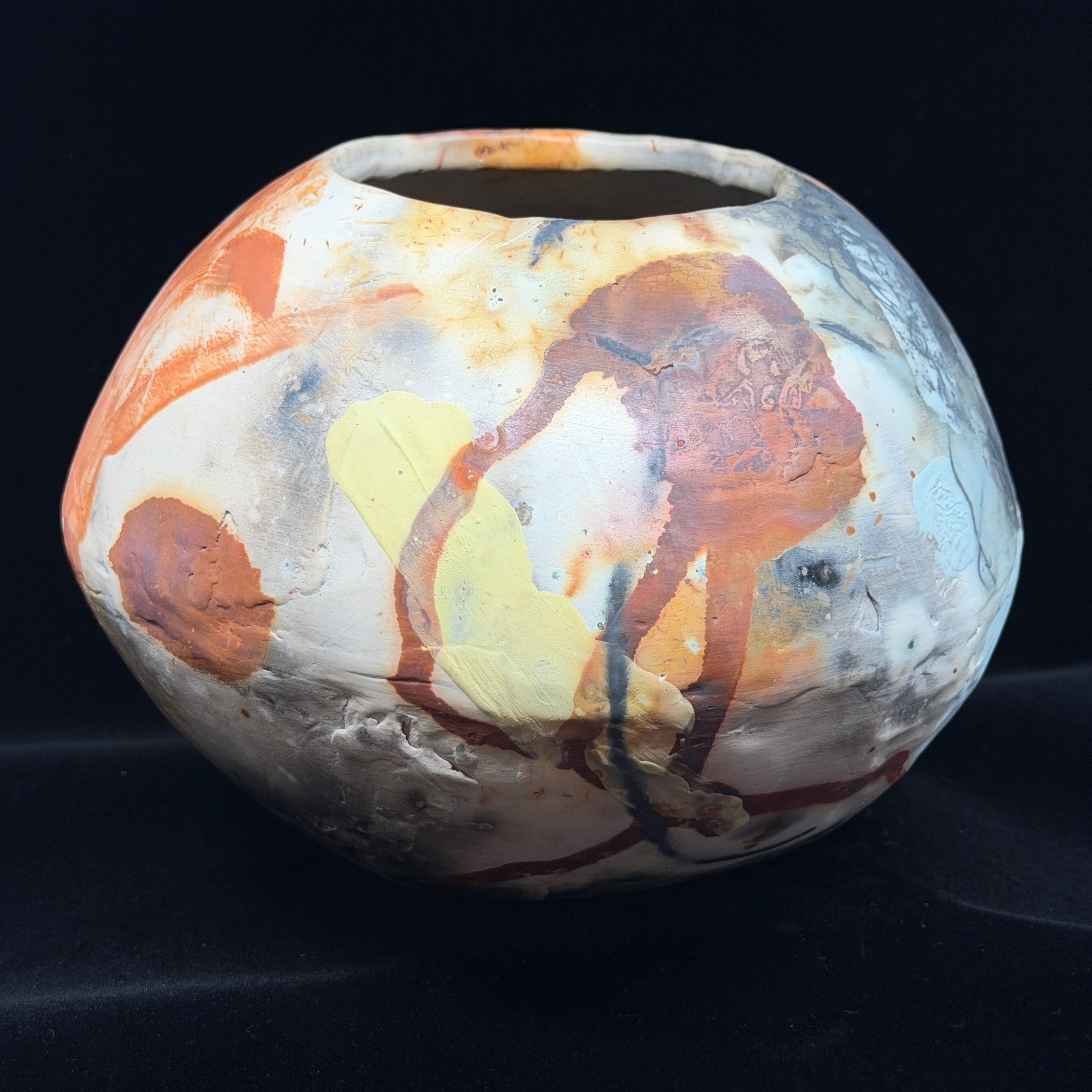 Rust, Black, White, Yellow Vessel