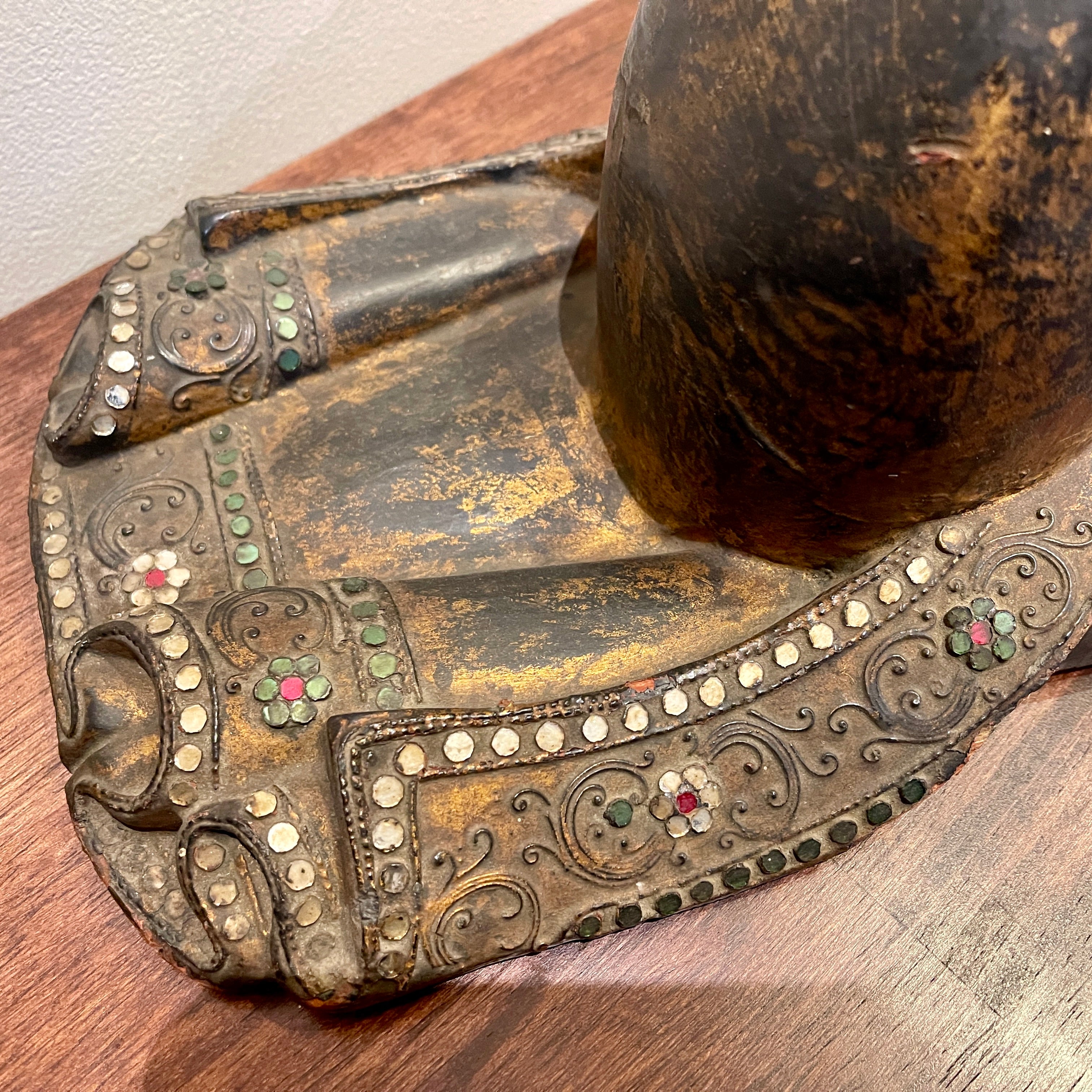 Carving of praying man